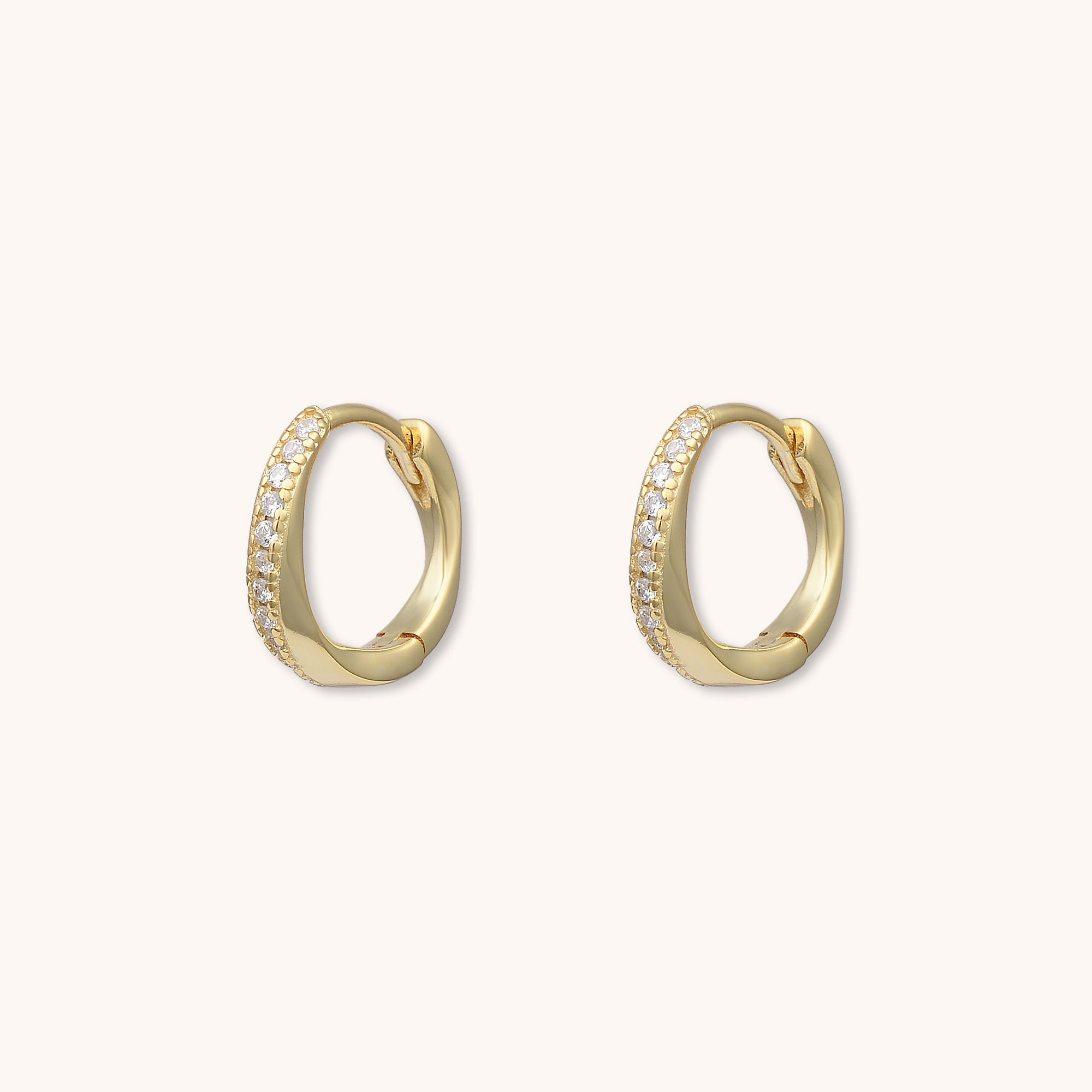 Swirl Zirconia Huggie Earrings Gold